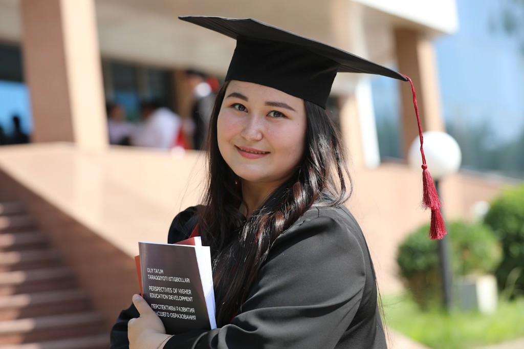 Graduate student with books
